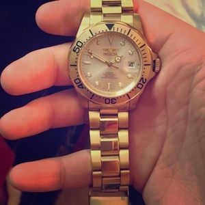 Invicta gold watch